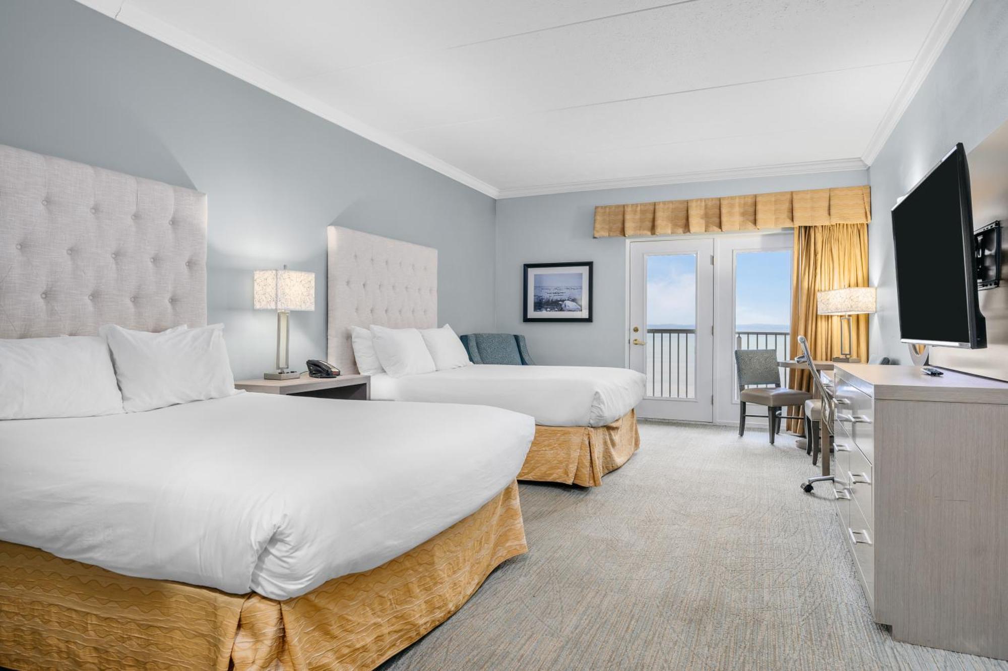Cherry Tree Inn & Suites Травърс Сити Екстериор снимка