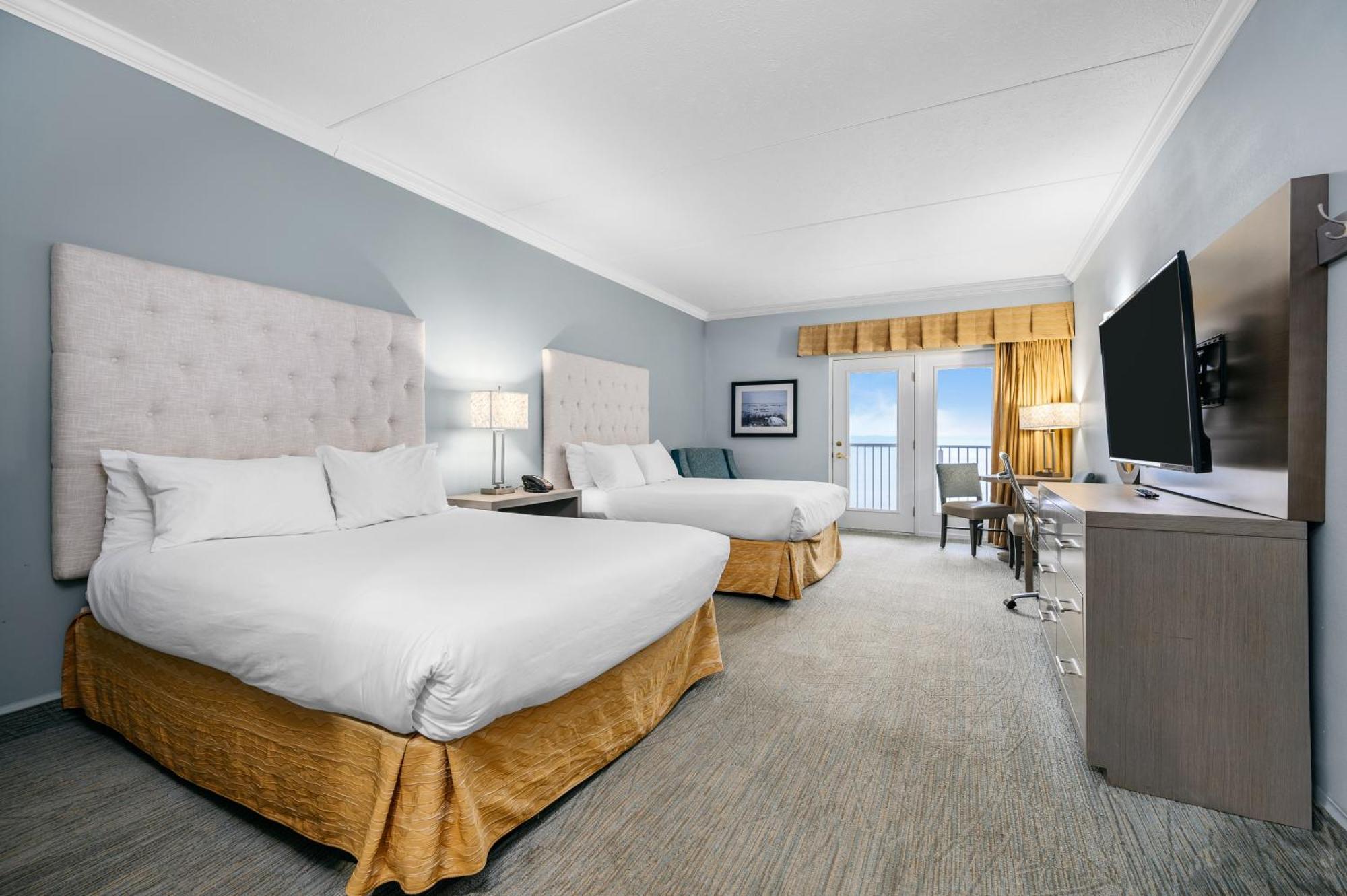Cherry Tree Inn & Suites Травърс Сити Екстериор снимка